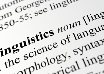 Image of dictionary open to the word 'Linguistics'