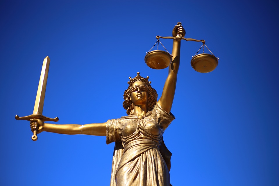 A Photo of lady justice holding the scales of justice