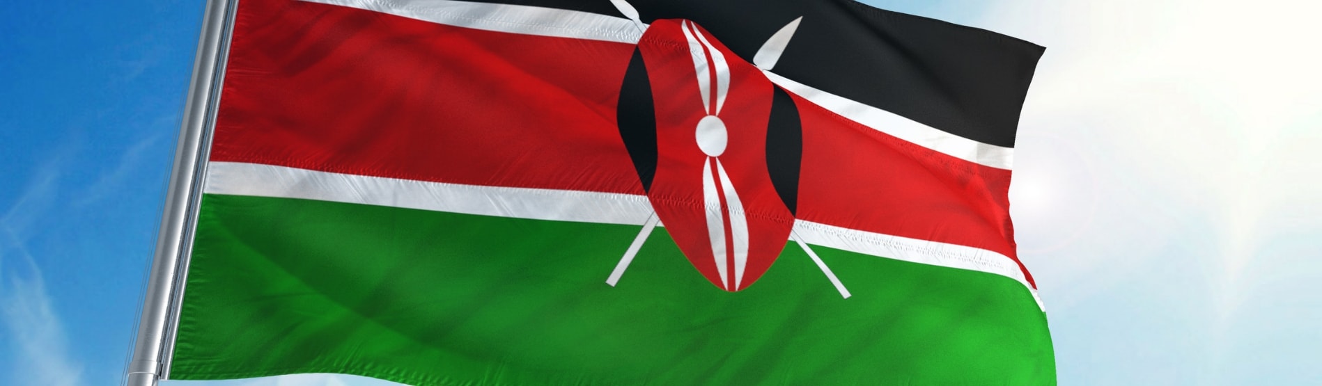 Kenyan flag blowing in the breeze.