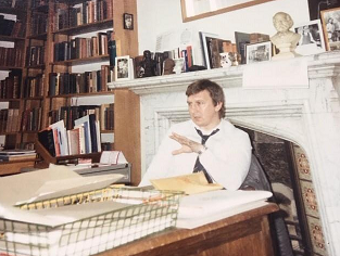Hywel Francis sitting in the South wales Miners' Library at Hendrefoelan House