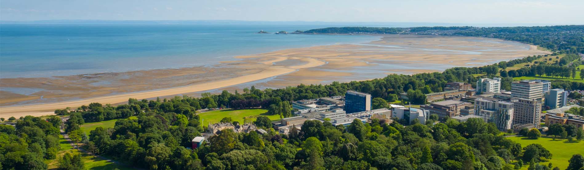 An aerial shot of Singleton Campus and Swansea Bay