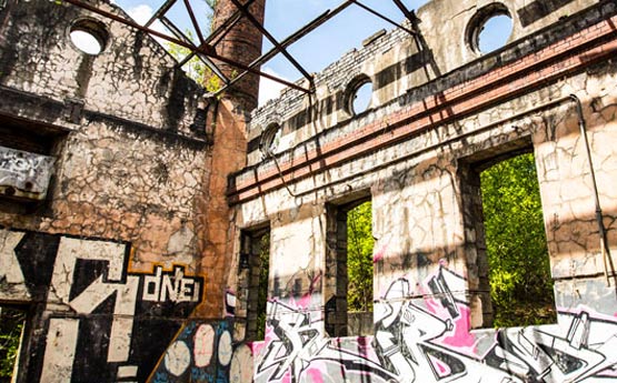 Derelict building with bright graffiti