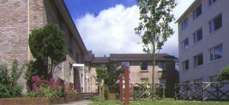 Exterior view of Beck House Residences in the sunlight