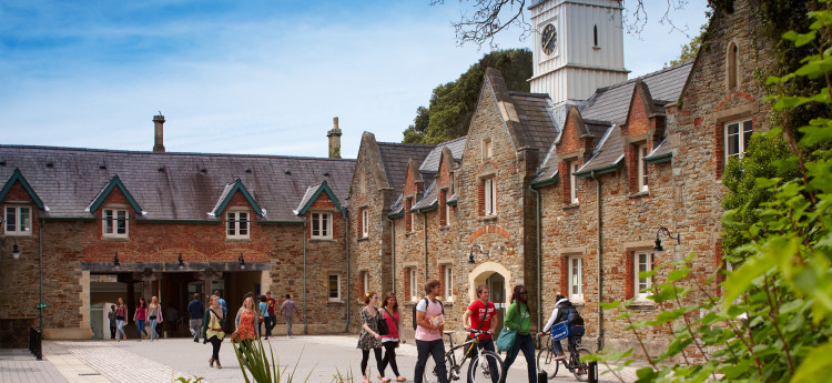 Abbey building with students