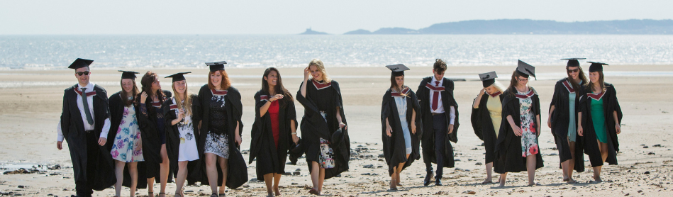 Graduates on the beach