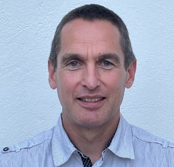 Image of man smiling at the camera