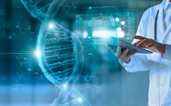 Someone looking at DNA on a laptop