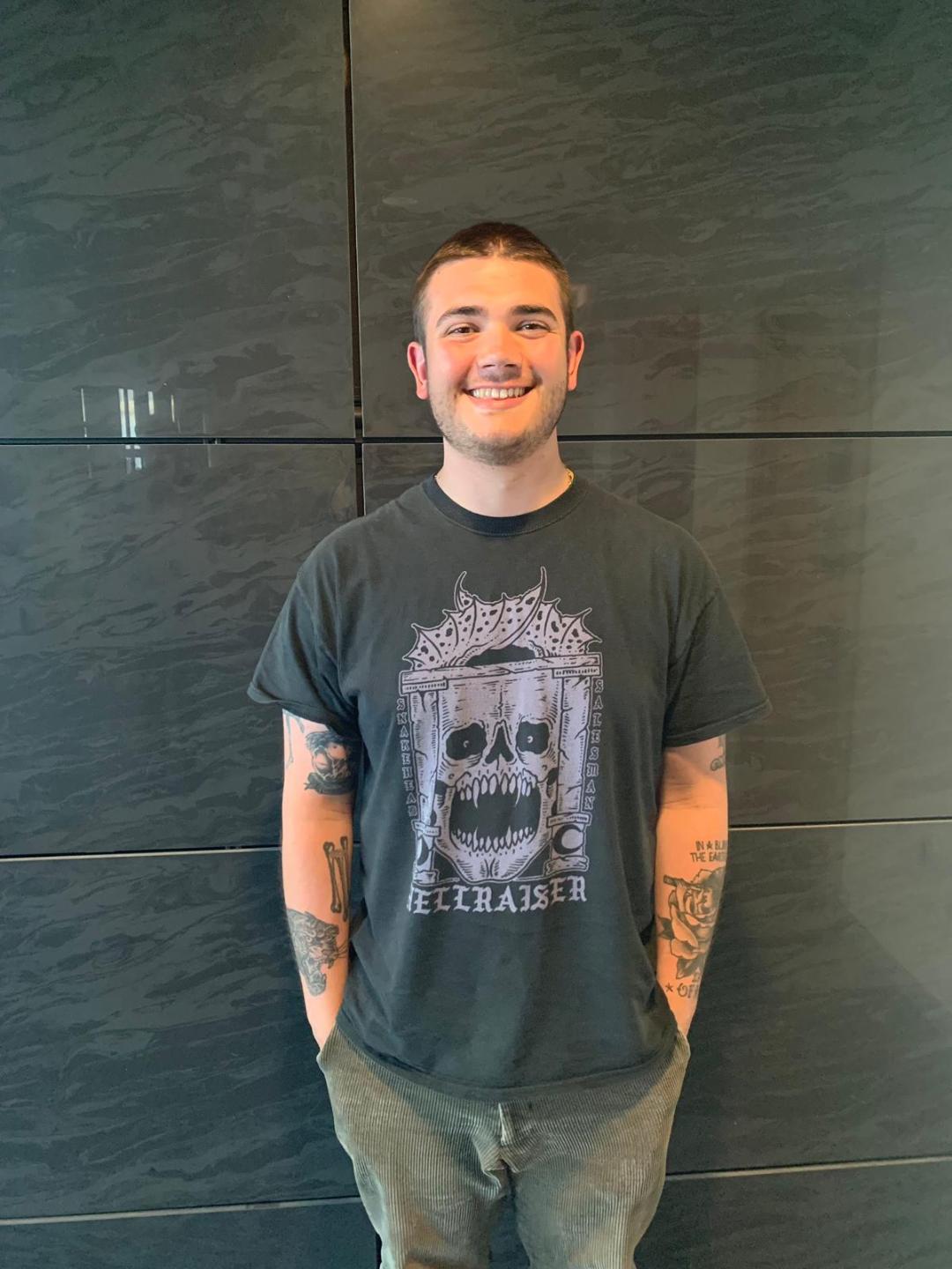 Male student standing headshot