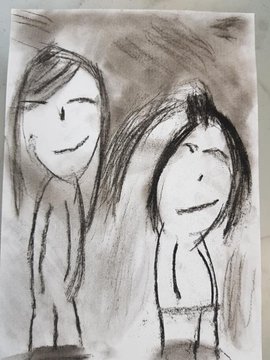 Charcoal drawing of two figures. 