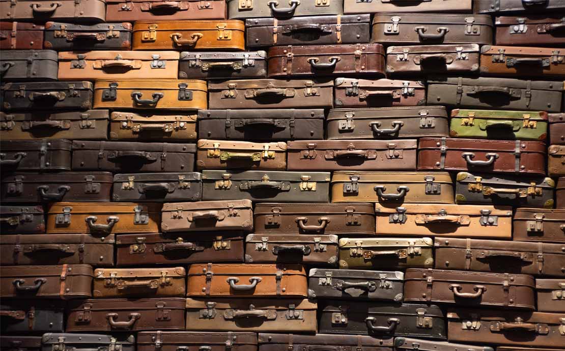 Image of a wall made of suitcases