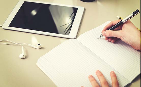 a person adding notes