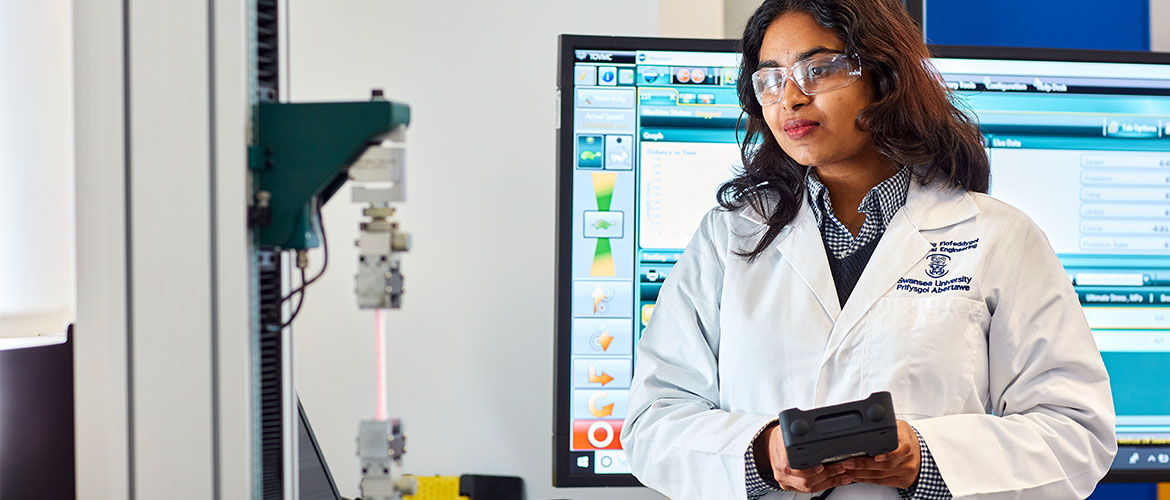 Biomedical student conducting tensile test