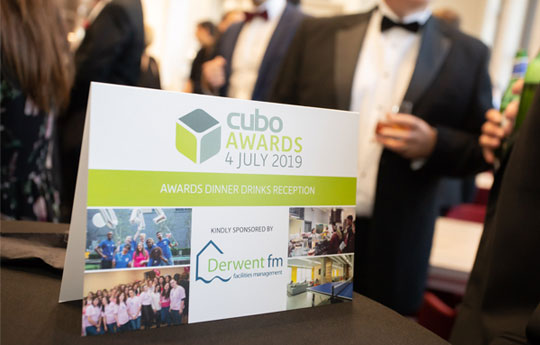 People in smart attire at CUBO drinks reception