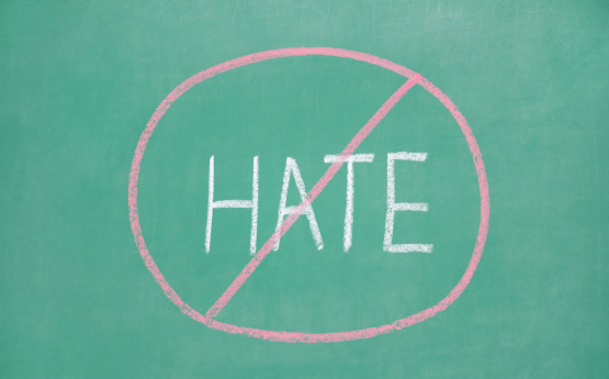 The word hate with strikethrough