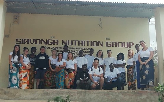 A group of Discovery and Siavonga Nutrition Group volunteers in Zambia.