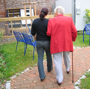 Elderly lady with support worker