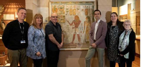 Egypt Centre staff with Howard Carter's artwork 