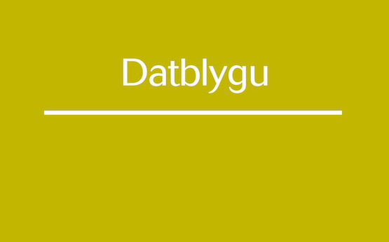 Logo melyn Datblygu