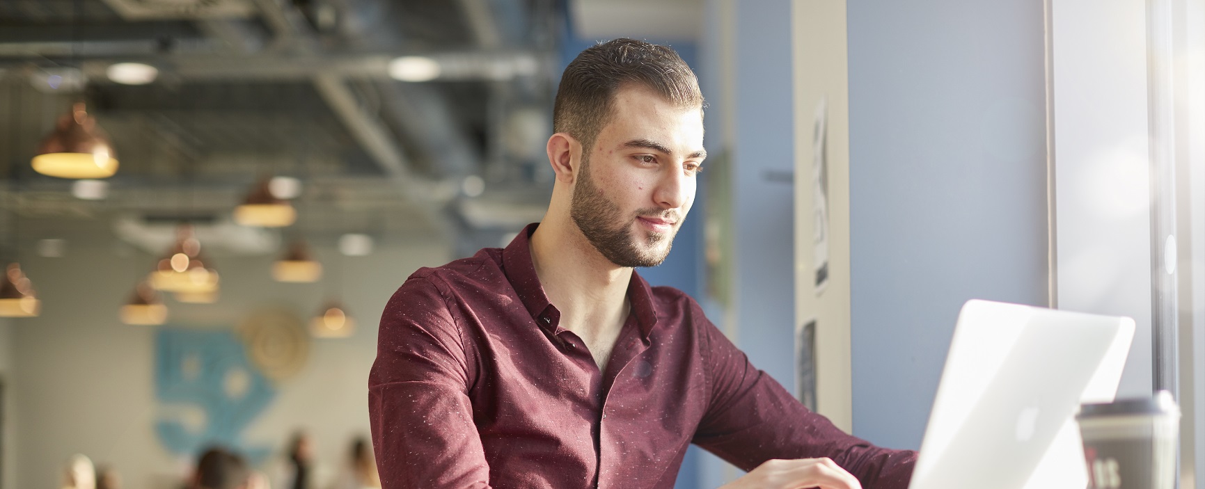 Student looking at laptop