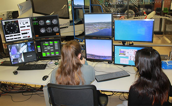 Students in Flight Sim Lab