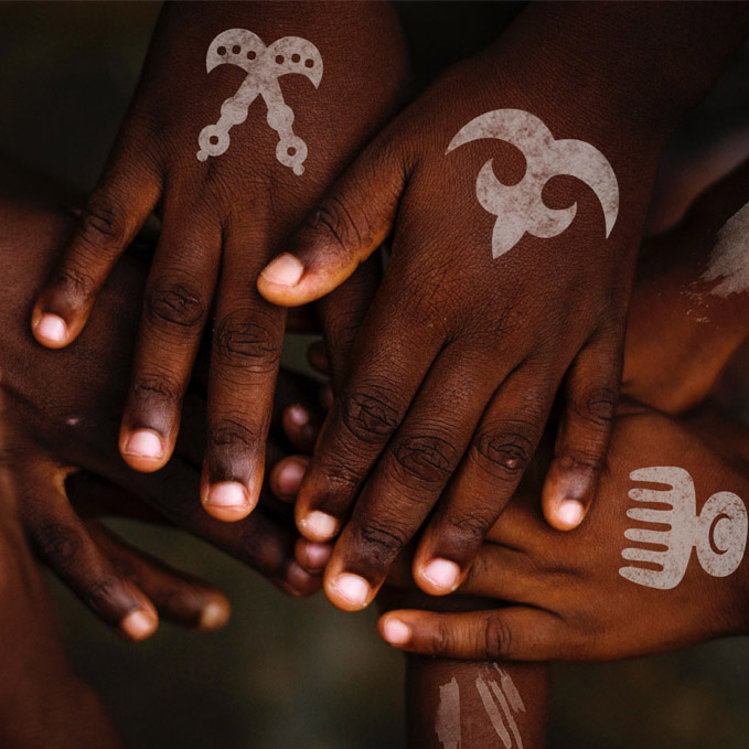 Image of a hands with symbols