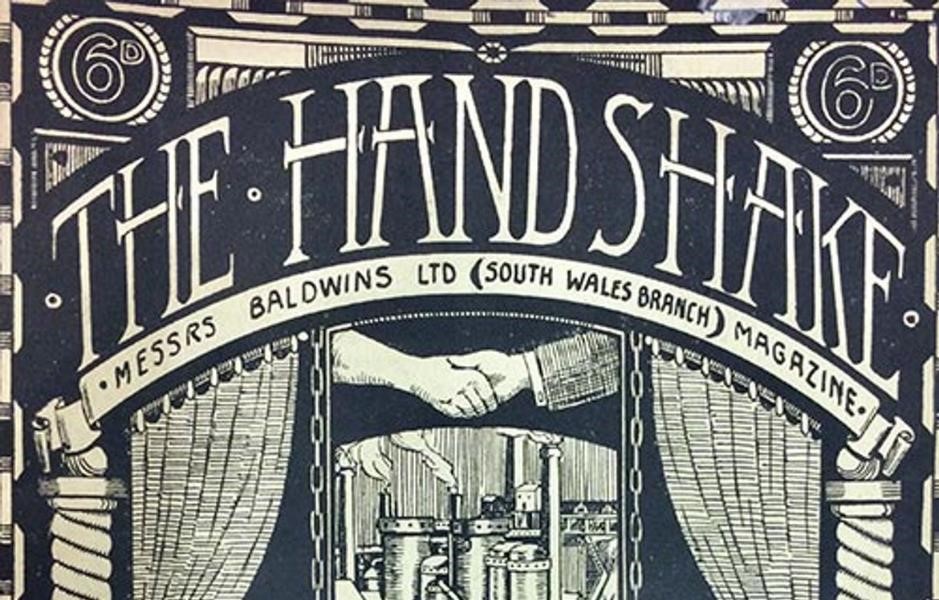An old sign demonstrating a handshake. 