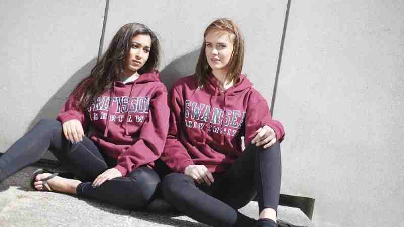 Students wearing Swansea Uni hoodies