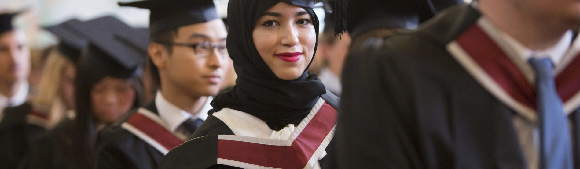 girl smiling at graduation