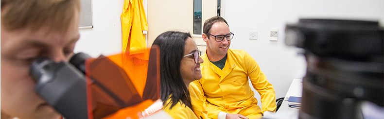 Researchers in Yellow Lab Coats