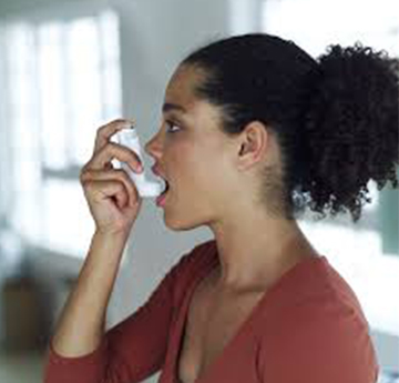 Adult using an Inhaler