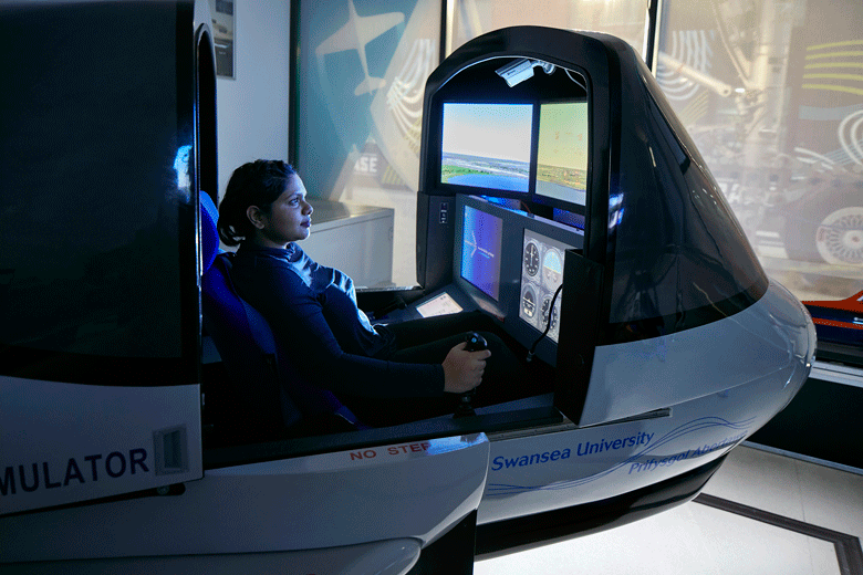 Female student in flight simulator 
