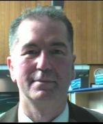 A head shot of Dr Tim Pryce-Brown