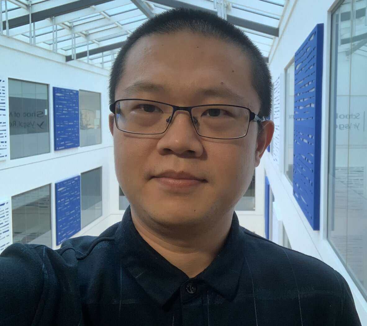 A head shot of Dr Guoqing Zhao