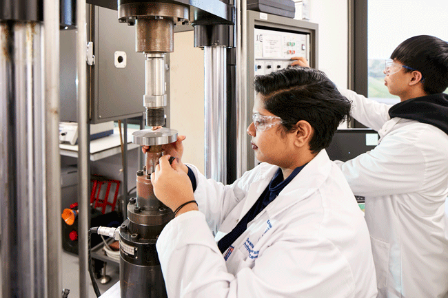 Female student in material science research lab