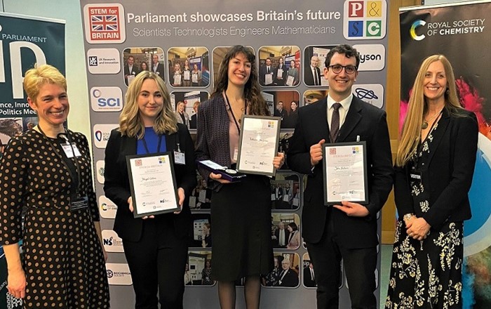 John Hudson, second from right, receiving his chemistry award in the STEM for Britain competition in Parliament