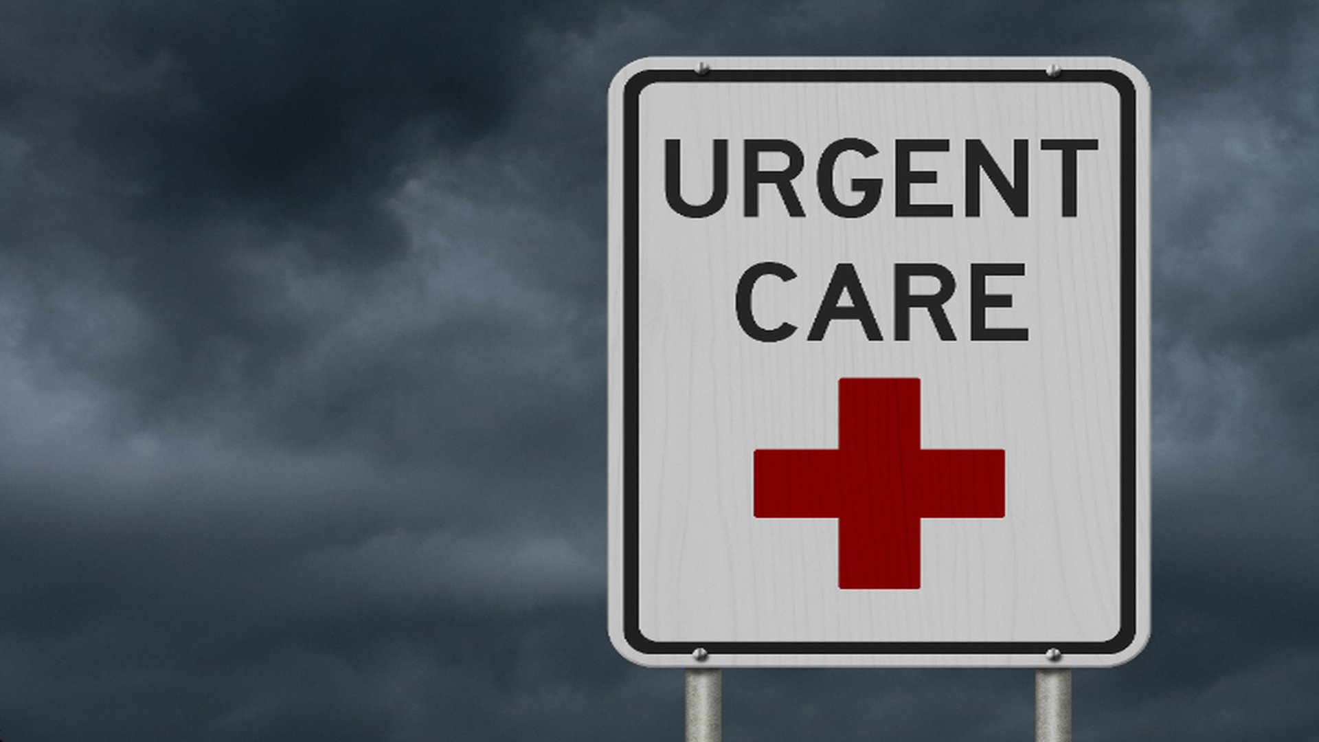 Arwydd petryal gwyn sydd â chroes goch a GOFAL BRYS arni.