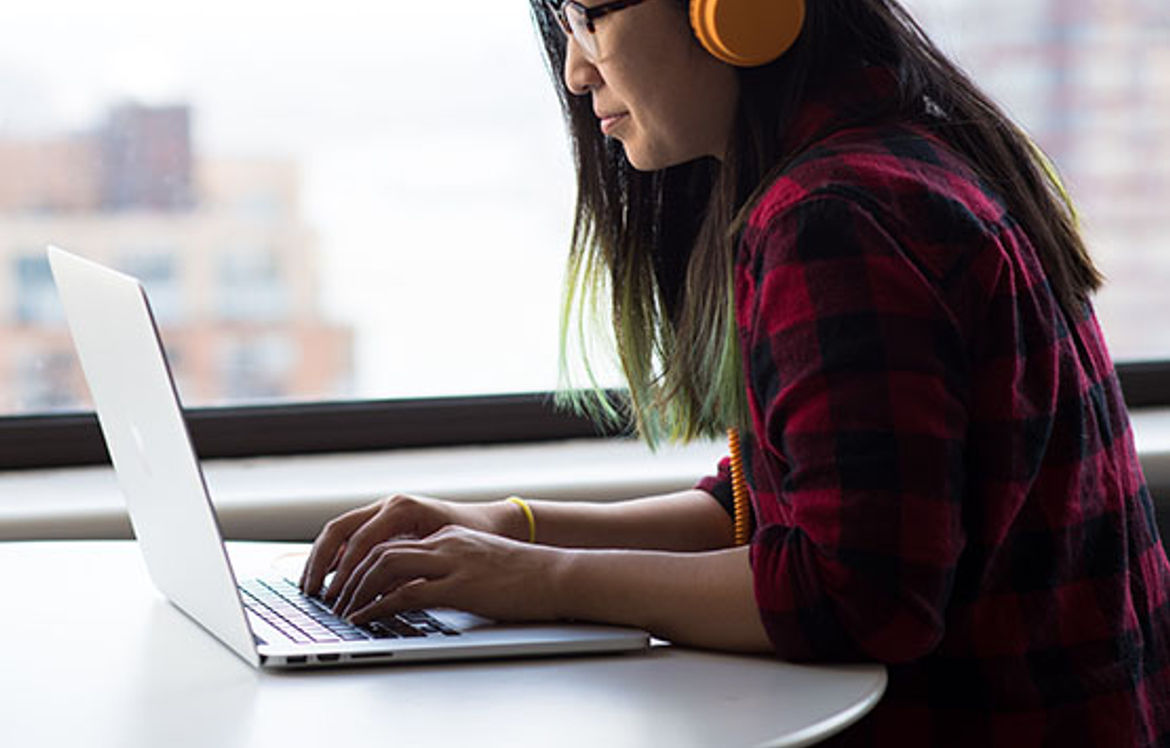 girl performing user testing on laptop