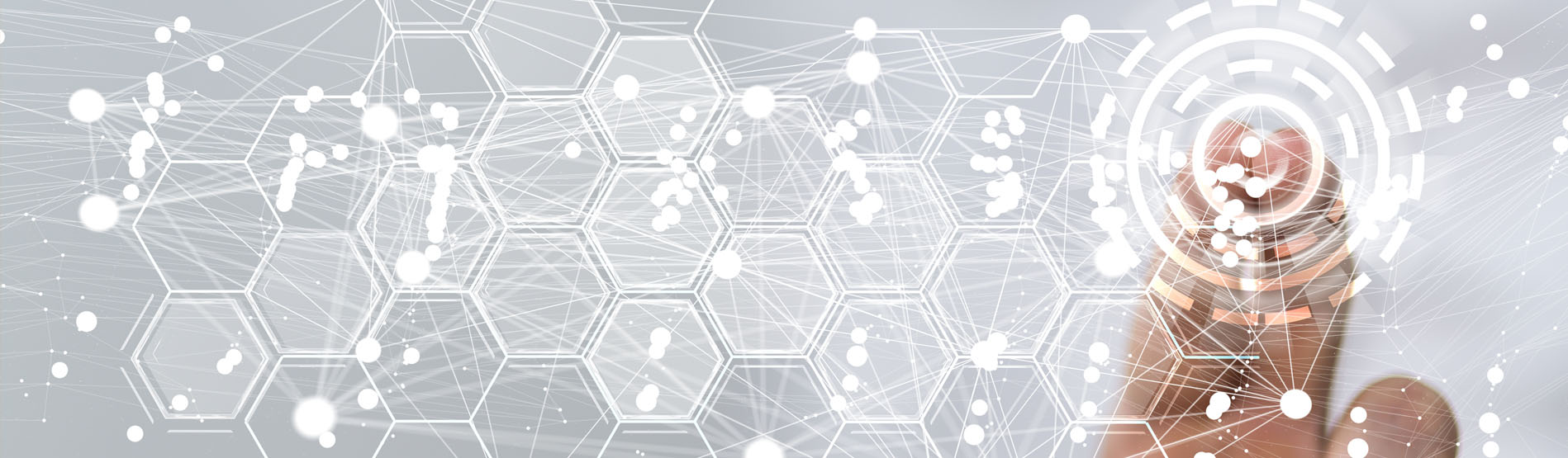 An index finger pointing to a screen with digital icons