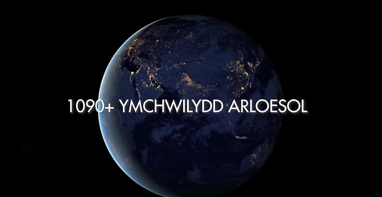 planet earth with overlaid welsh text
