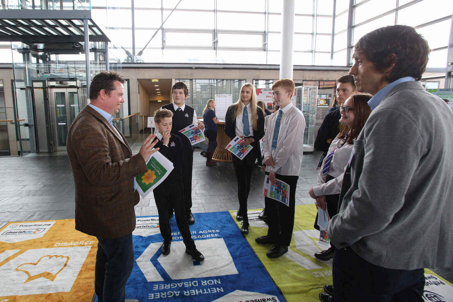 Matt Wall in Senedd with young people
