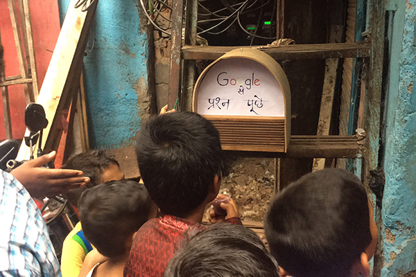 Children in Mumbai with made Google smart speaker