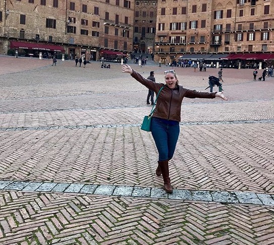 Female student having fun in Tuscany 
