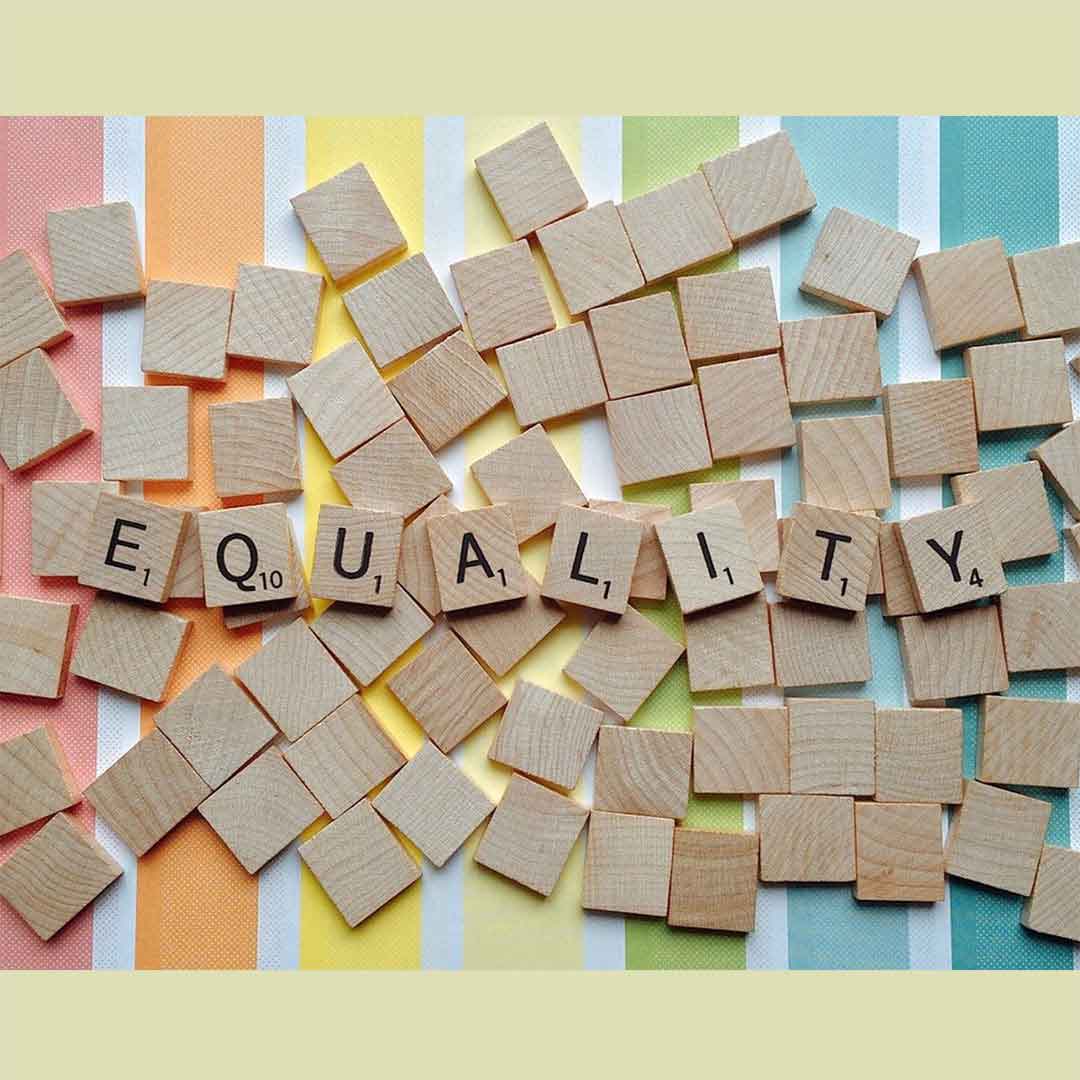 Scrabble tiles featuring the word equality