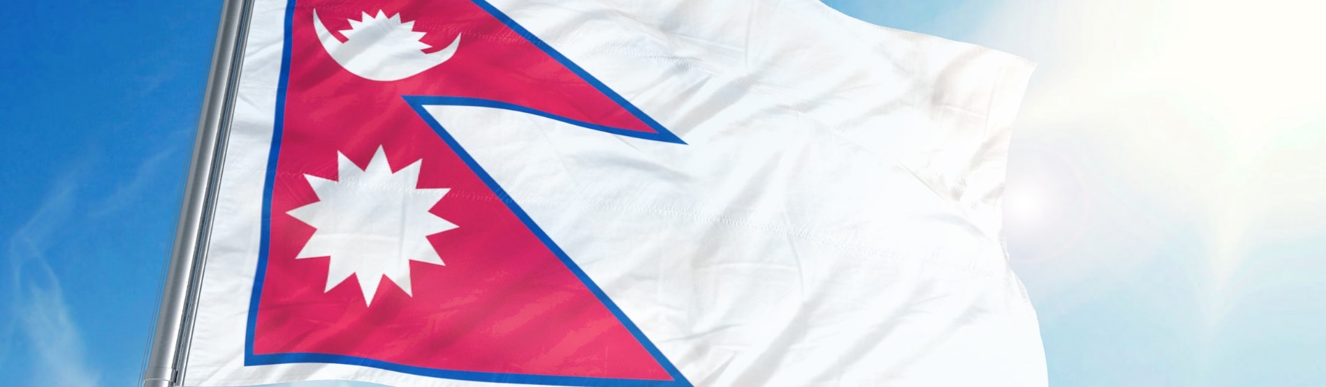 Flag of Nepal waving in the breeze.