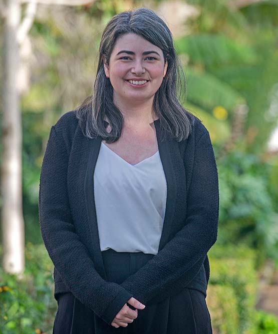 Student smiling at camera