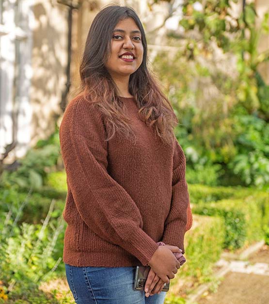 Student smiling at camera.