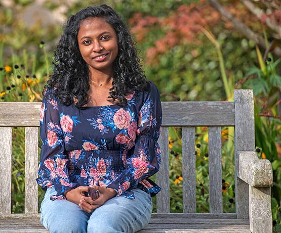 Student smiling at camera