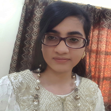 student smiling at camera