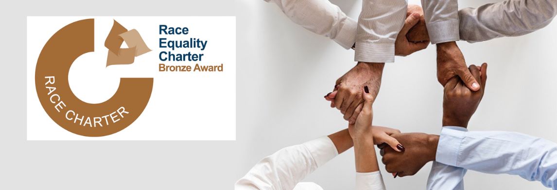 Equality charter mark logo and image of people holding hands