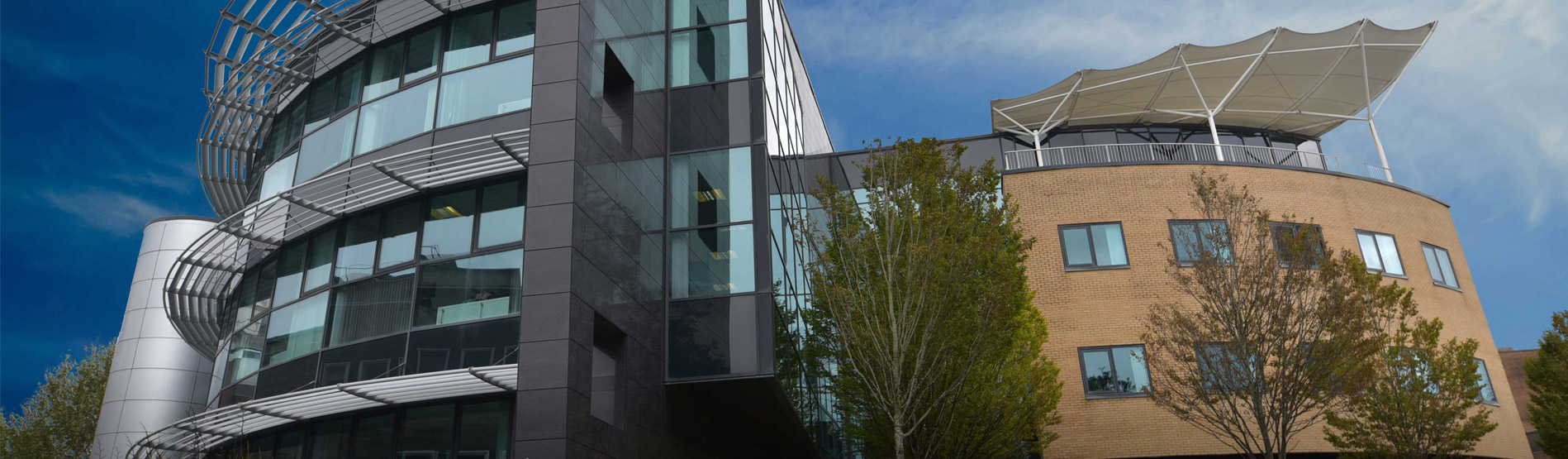 a group of students outside the richard price building